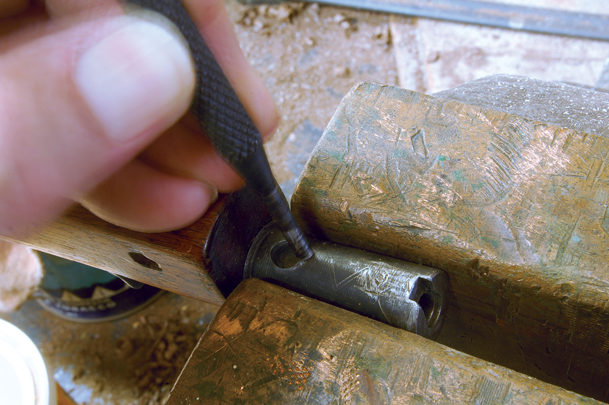 If the barrel/receiver joint is loose, tapping on the takedown screw hole will generally correct it.